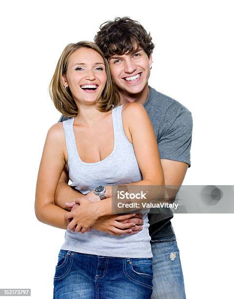 Portrait Of A Happy Couple Isolated On White Stock Photo - Download Image Now - 20-24 Years, Adult, Adults Only
