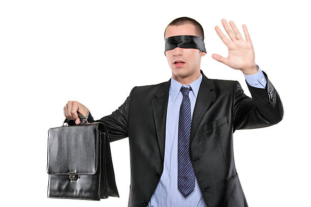 istock Confused blindfold businessman with briefcase 152173927