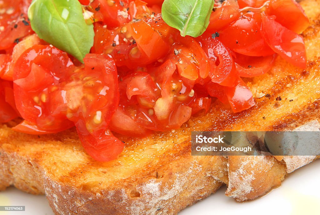 Bruschetta mit Tomaten - Lizenzfrei Basilikum Stock-Foto