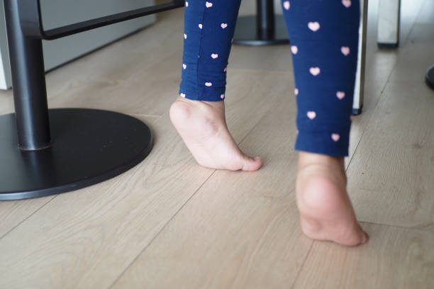 istock low angle view of A child walking on tiptoes 1521750752