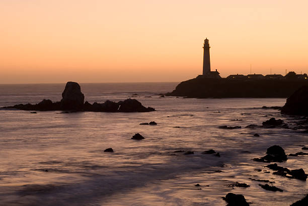 Lighthouse at Pigeon Point California Lighthouse at Pigeon Point just after sunset  producing silhouette of lighthouse and colorful sky..  The lighthouse is located about half way between Santa Cruz and Half Moon Bay California near Pescadero. mavericks california stock pictures, royalty-free photos & images