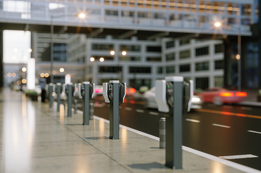 Electric Car Charging Station With Blurred Street Background