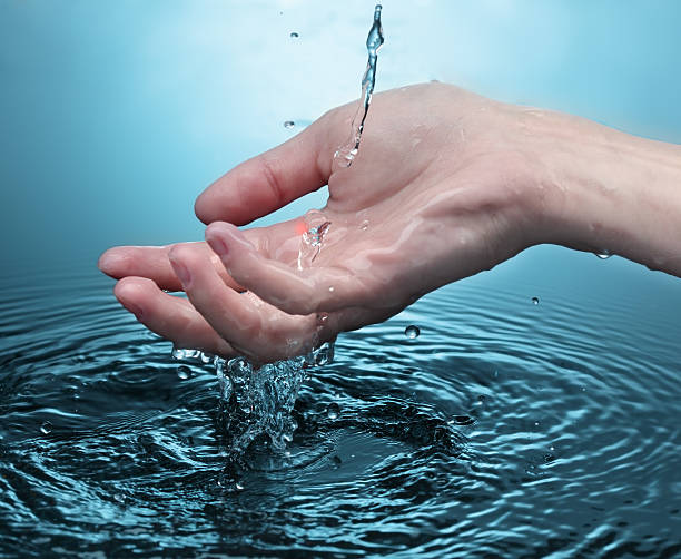 istock woman hand in water 152181153