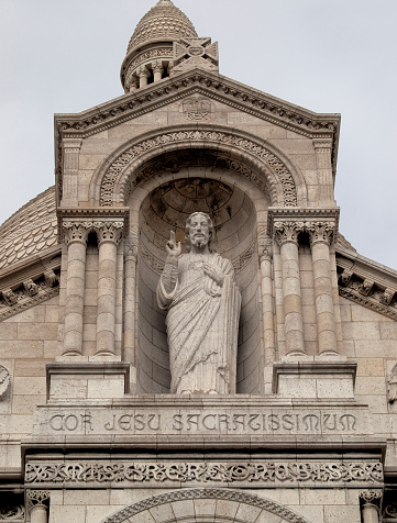Christ's image in the front of the Basilica of the Sacred Heart, in Montmartre's neighborhood, in Paris, France.