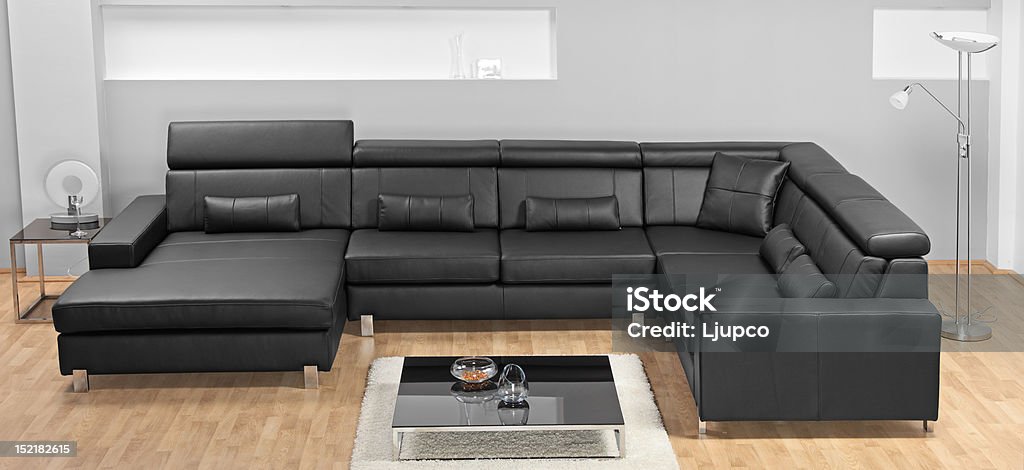Minimalista sala de estar com mobília de couro - Foto de stock de Aconchegante royalty-free
