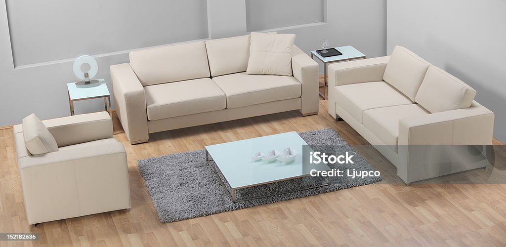 Minimalista e moderno, sala de estar com mobília de couro - Foto de stock de Aconchegante royalty-free