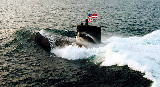 US Navy Submarine ARABIAN SEAâ The USS Albuquerque SSN-706 participates in a photo-exercise Sept. 10, 2006 in the North Arabian Sea. U.S. and Pakistani forces are conducting a bilateral exercise in the Northern Arabian Sea and in territorial waters of Pakistan as part of exercise INSPIRED UNION 2006. Exercise INSPIRED UNION enhances interoperability and tactical proficiency between coalition and regional forces, which may be used as part of regional maritime security operations. MSO set the conditions for security and stability in the maritime environment. us navy stock pictures, royalty-free photos & images