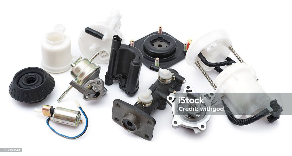 auto parts some auto spare parts against white background Machine Part Stock Photo