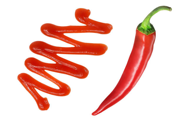 istock Chili pepper and chili pepper sauce on an isolated white background. 1521937030