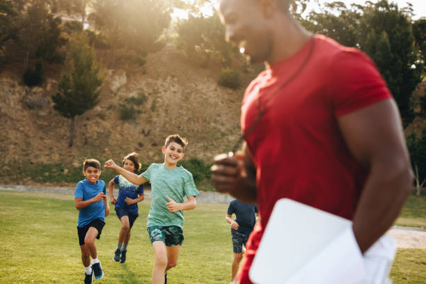 istock Children running on a school ground during PE 1521950118