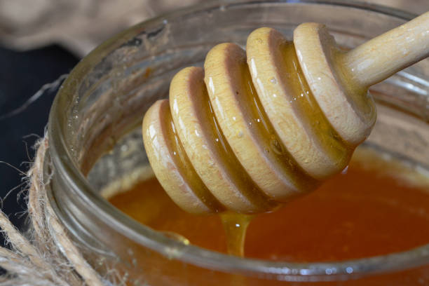 istock A wooden stick in honey 1521952764