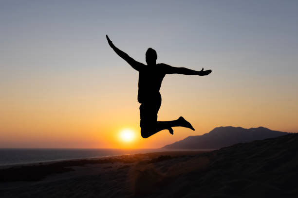 Man jumping in the beach