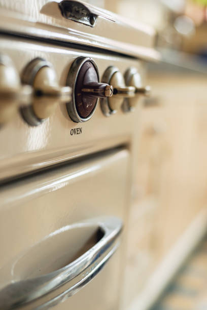 Control knobs of an old gas stove.