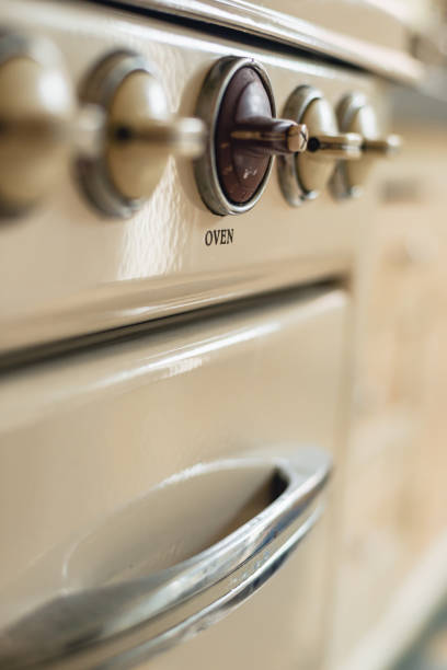 Control knobs of an old gas stove.