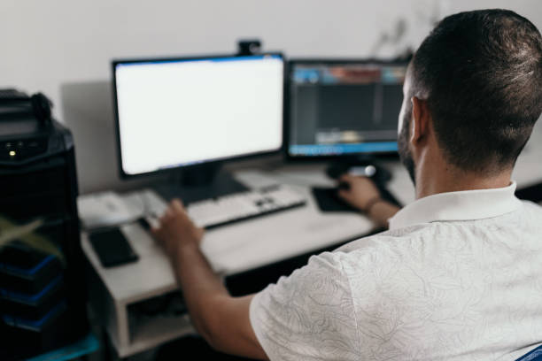 istock Male programmer working at home in his home office 1522097407