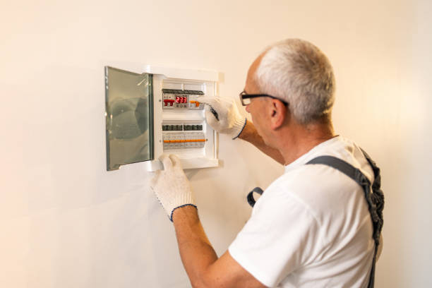 istock A professional electrician worker services an electrical switchboard at home 1522120395