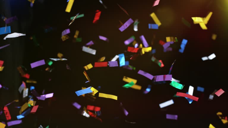 SLO MO LD Colourful confetti shimmering when falling