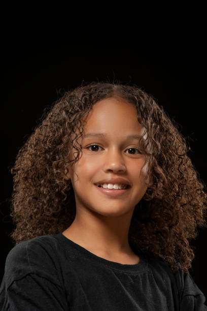 istock Beautiful young black girl posing for studio portrait 1522176868