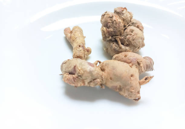 istock View of aromatic ginger isolated on white plate background 1522177394