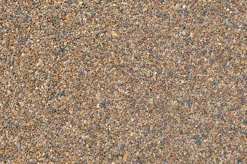 Colorful decorative gravel background close up used in gardens and construction