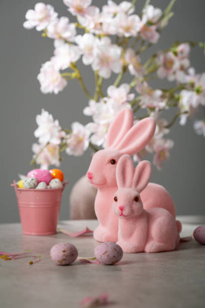 istock pink Ester bunny decor eggs candy flowers holiday concept 1522189849