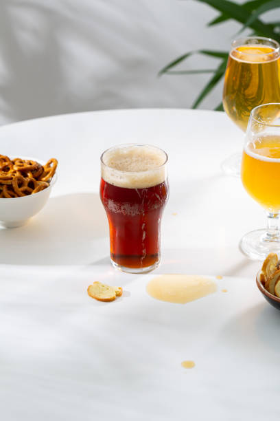 istock A few glasses with cold beer snack food and drink on light table 1522191506