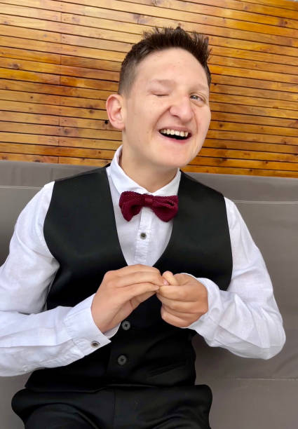 Disabled partially blind boy portrait dressed for prom