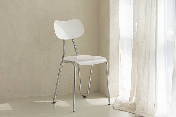 istock Modern white chair in beige room interior 1522261422