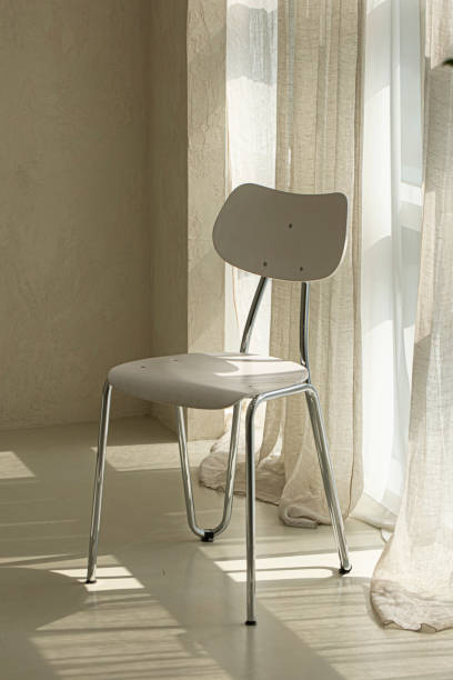 istock Modern white chair in beige room interior 1522268066