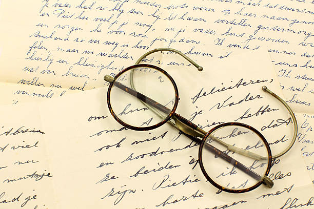 istock pair of old glasses on some letters 152227280