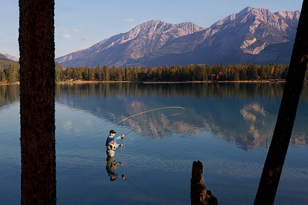 istock Fly Fishing In Rocky Mountains, Alberta, Canada 152227410