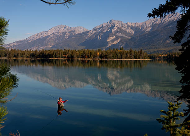 istock Fly Fishing In Rocky Mountains, Alberta, Canada 152227459