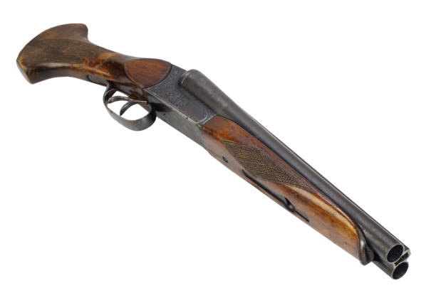 istock Sawn-off shotgun isolated on white. 1522285871