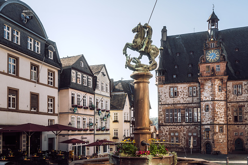 Charlemagne Fountain at Market Square (Marktplatz) in Aachen, Germany. In 1620 craftsman Franz von Trier cast the bronze bowl of the fountain. The statue of Charlemagne was created in Belgium. The fountain was renovated in 1735.