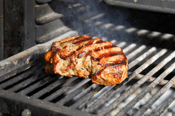 istock Steak. Preparation of steak on the grate. 1522332783