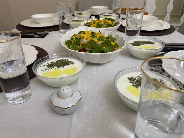 istock Dining table with porcelain plate and glass. 1522332803