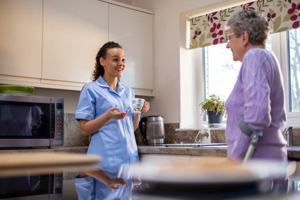 istock Visit from Nurse To The Patient at Home 1522335084