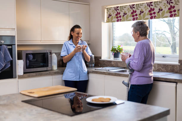 istock Home Nurse and Patient in Kitchen 1522336774