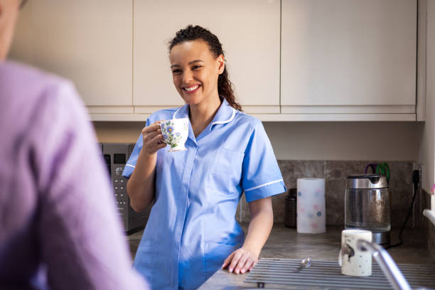 Home Nurse Having a Cup of Tea