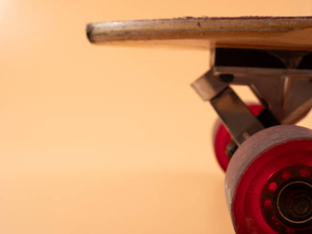 istock Skateboard on an orange background. 1522346413