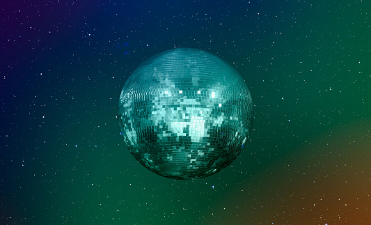 Party disco mirror ball reflecting green lights
