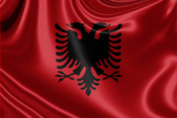 istock albania fabric flag waving Illustration. 3D illustration 1522356743