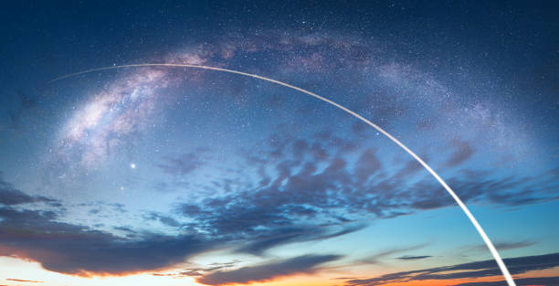 Long Exposure Night Time Rocket Launch - Planet Earth with a spectacular sunset Milky Way galaxy in the background 