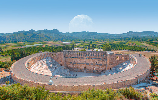 Aspendos amphitheater with full moon - Antalya Turkey