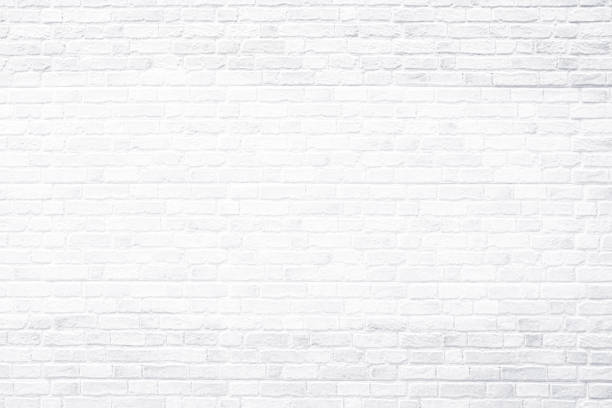 istock White brick wall, antique old grunge white texture background. 1522372611