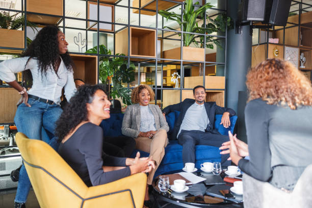 istock Multi-Ethnic People Taking A Break At The Office, Talking And Bonding 1522376873