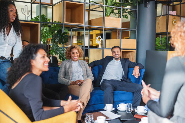 istock Happy Mixed Race Employees Having A Nice Conversation During A Break At Work 1522377971