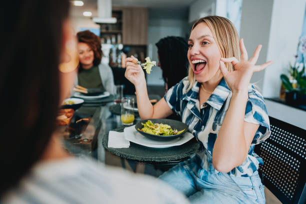 istock Friends having lunch together at home 1522413278