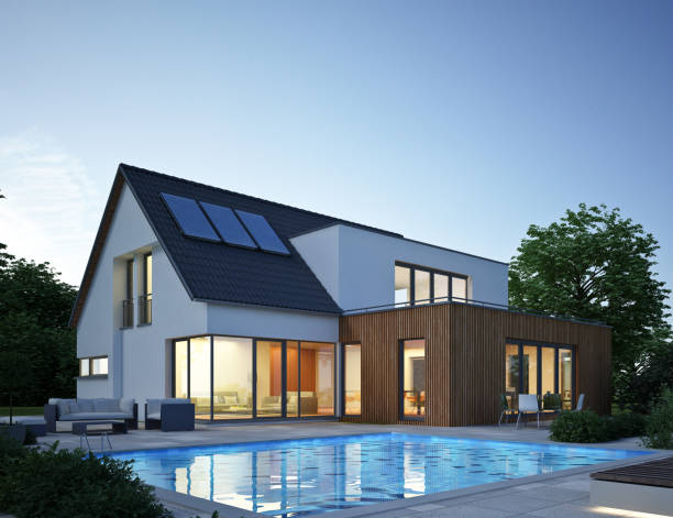 istock Modernized house with solar panels and pool in the evening 1522420834