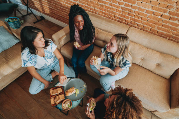 istock Girlfriends eating a vegan snack 1522421416